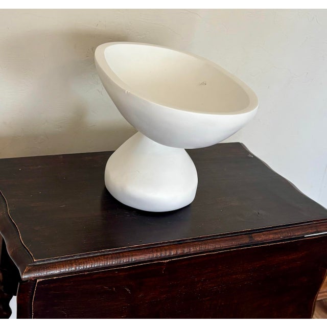 Bring clean sculptural form and sophisticated minimalism to your tabletop with this matte white pedestal bowl by luxury...