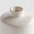 In the perfect shade of warmWhite and finished in a crackle glaze, this bottle vase adds a subtle sophistication to any...