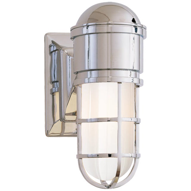 Marine Wall Light in Chrome with White Glass Designer: Chapman & Myers Height: 10.5" Extension: 7.75" Backplate: 4.5" x...
