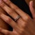 This elegant vintage diamond half eternity band is a timeless 1990’s design, featuring 19 princess and baguette cut...