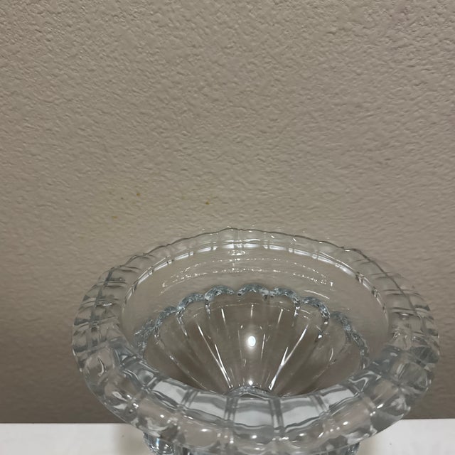 Enhance your home decor or event tablescape with this elegant, clear glass compote bowl. Featuring a classic low pedestal...