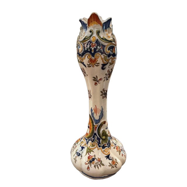 A beautiful, classic example of Rouen pottery. It has a distinctive baluster profile with a bulbous, scalloped base with a...