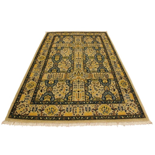 Designed with a mesmerizing intricate traditional motif this glorious hand knotted rug is a masterpiece that will fill any...