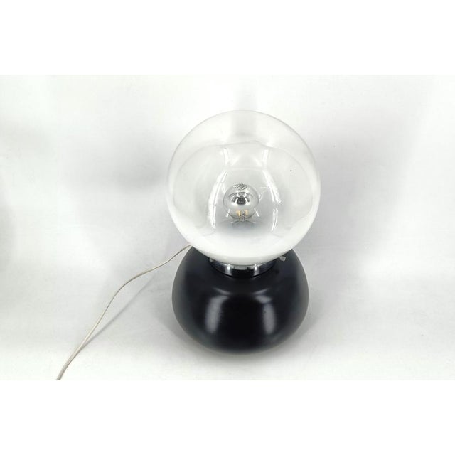 Mid century murano glass table lamp by Mazzega. The lamp emits a beautiful light. Tested and ready to use with a regular...