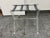 Design Plus Gallery presents a Butler Acrylic Folding Luggage Rack. This folding luggage rack has a transparent acrylic...