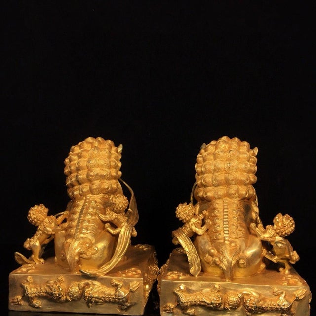 Pair of Gilt Bronze Guardian Lions – 7.9" Foo Dogs on Dragon Relief Bases With Xuande Mark For Sale - Image 4 of 9