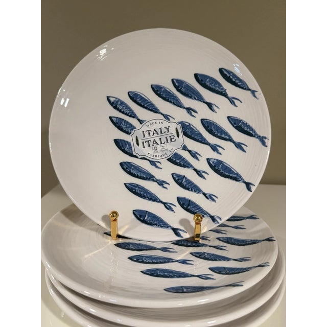 Bring the charm of the Italian coast to your table with this delightful **set of four vintage Ceramiche d'Italia salad...