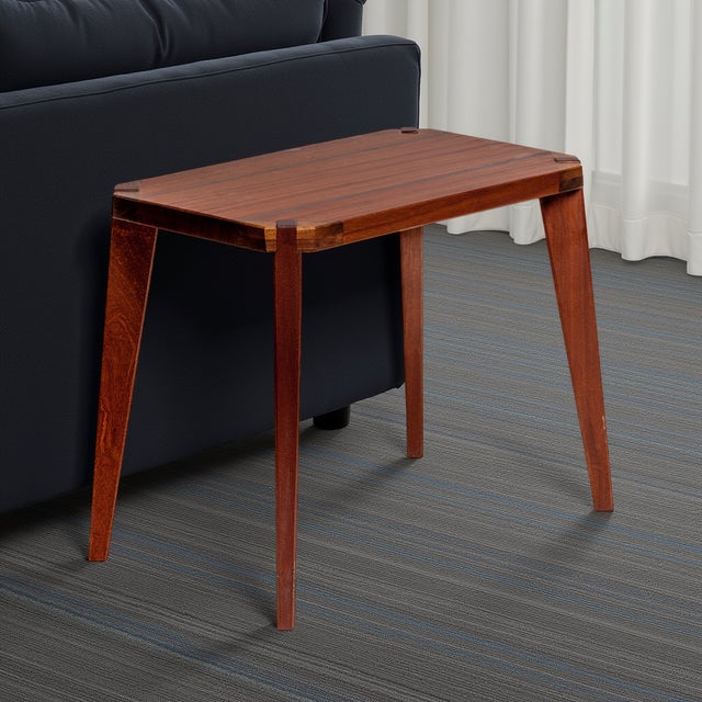 Open joinery end table handmade from African mahogany and Pennsylvania walnut. Simple, clean lines yet feels substantial....