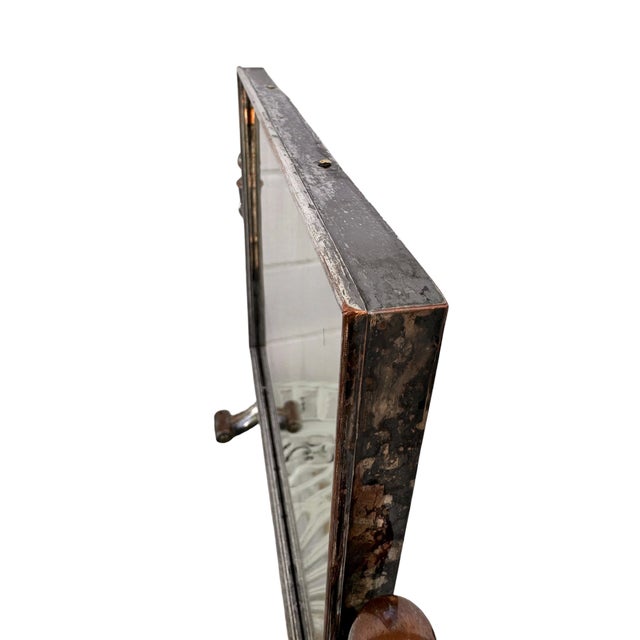 17”W x 16 1/4”H x 6”D This exceptional late 19th-century tabletop cheval mirror—historically known in French antique...