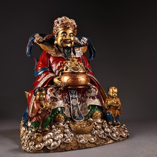 This is a substantial antique polychrome bronze sculpture depicting a God of Wealth, a revered deity in traditional Asian...