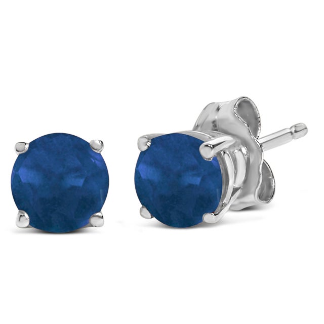 Encapsulate timeless elegance with these 14K White Gold stud earrings, each graced with a meticulously color-treated,...