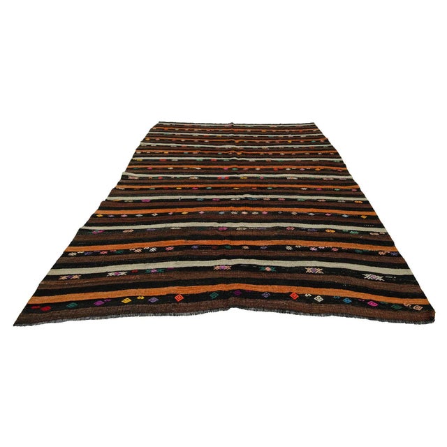 Handwoven vintage kilim rug from Afyon region of Turkey. Approximately 50-60 years old. In very good condition.
