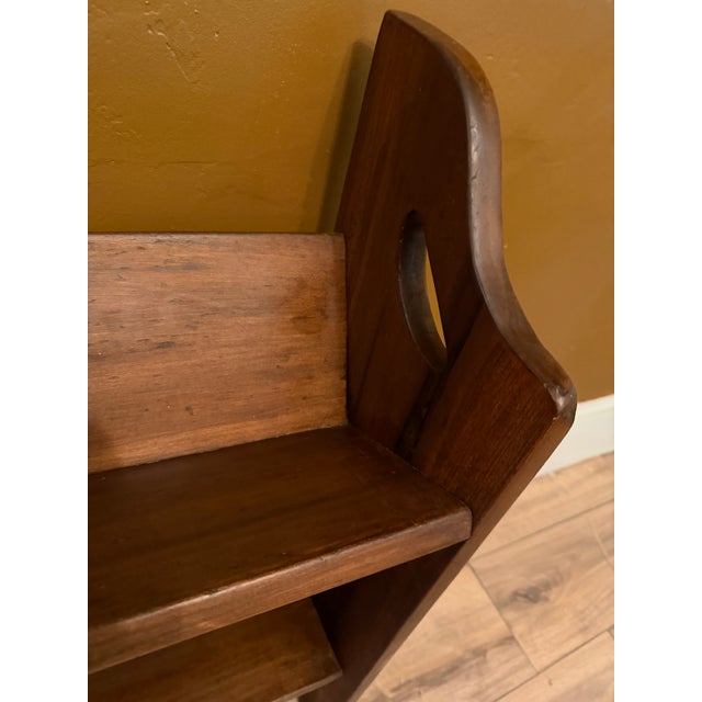 Embrace the honest craftsmanship of the early 20th century with this striking antique Arts & Crafts period two-tier book...