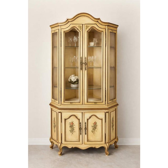 Gorgeous handpainted French Provincial corner china display cabinet. In wonderful age appropriate condition. Overview:...