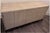 Credenza finished in warm Hudson Beige shagreen with brass hardware. This substantial statement piece with generous...