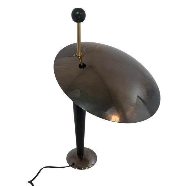 Rare model lamp made by the Dutch company Herda. Produced under number B-1352 and nicknamed ‘Schijvenlamp’ wich translates...