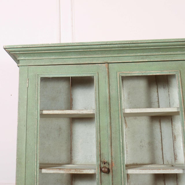 Useful 19th C English painted glazed pine kitchen dresser, lots of storage. 1850 Upper shelf depth- 26.5cm This piece is...