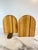 A sophisticated pair of handcrafted bookends featuring a soft, radiused "tombstone" silhouette. Constructed from solid...