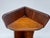 Vintage wood corner shelf with a distinctive two-tier design, curved side profile, and rich dark brown finish. Constructed...