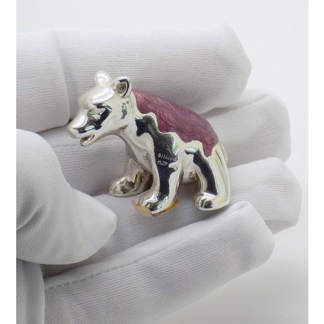 Steeped in the prestigious silvermaking legacy of Rome, this solid 925 sterling silver bear cub sculpture by Ottaviani...