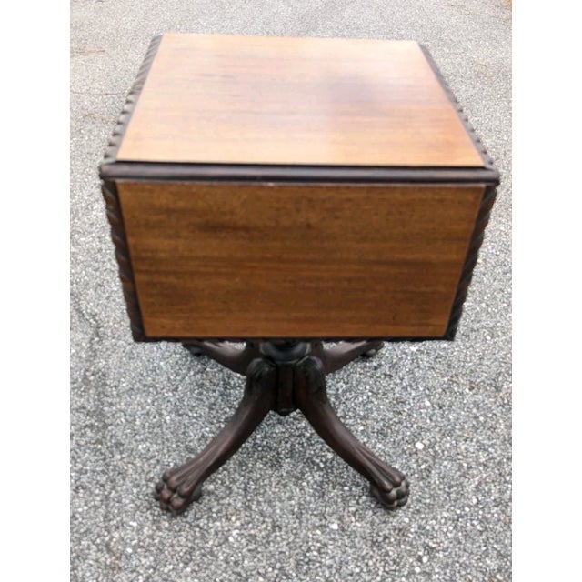 Antique (late 19th century - early 20th century) Empire Revival Sewing Work Table by Hersee Furniture in Flame Mahogany....