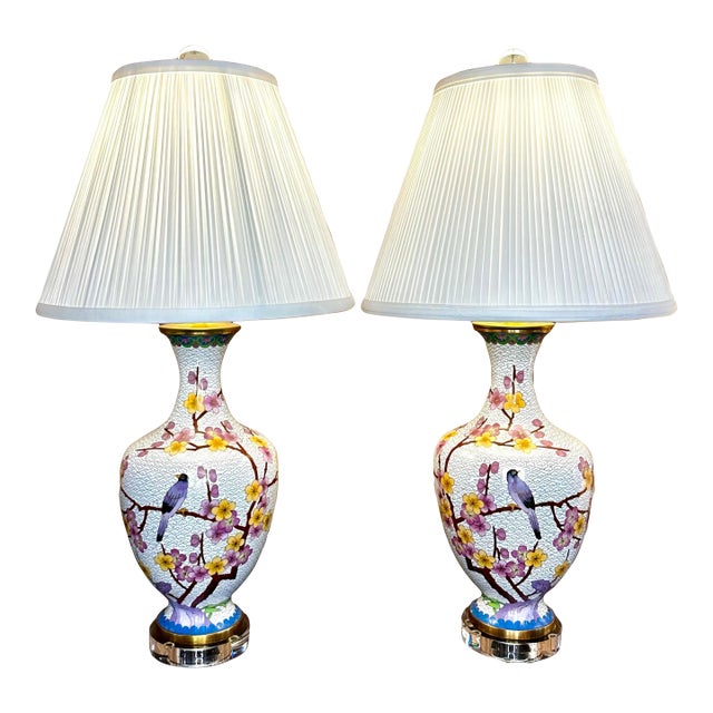 Pair of Cloisonné Birds Lamps on Lucite Paired With White Silk Pencil Pleated Shades. For Sale