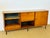 Stunning vintage sideboard with a Scandinavian design from the 1960s, remarkable for its elegance and unique architectural...