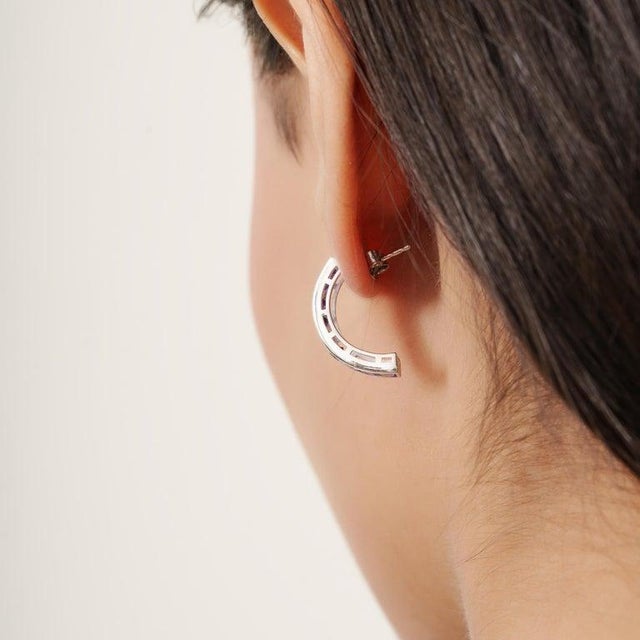 Crafted in 925 sterling silver, these amethyst gemstone earrings feature a delicate arrangement of round-cut amethyst...