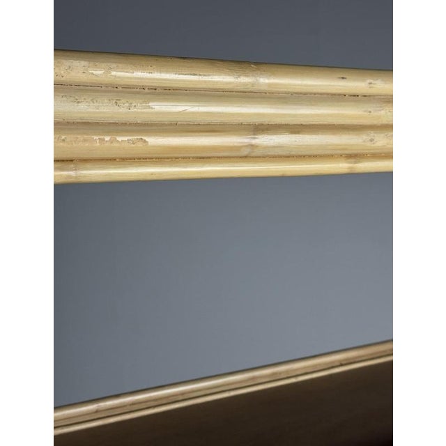 Vintage bamboo bookcase. Originating from France, circa 1980. Signs of use consistent with age. Dimensions: 197H x 101W x 37D