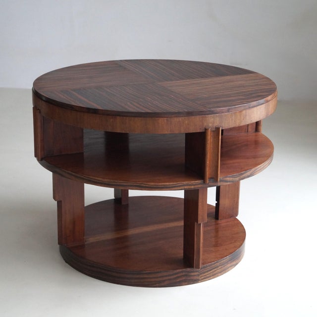 A bold expression of the Amsterdam School movement, this substantial center table marries sculptural rhythm with...