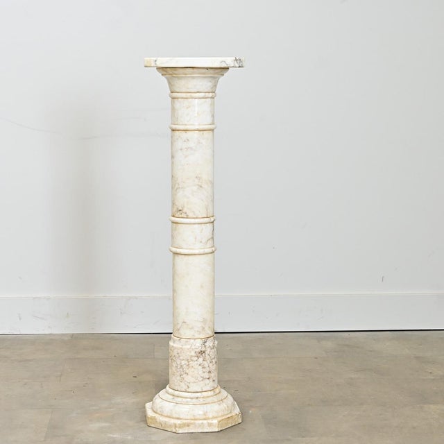 A fabulous late 19th century carved marble display pedestal from France, to elevate precious artwork, décor, or greenery...