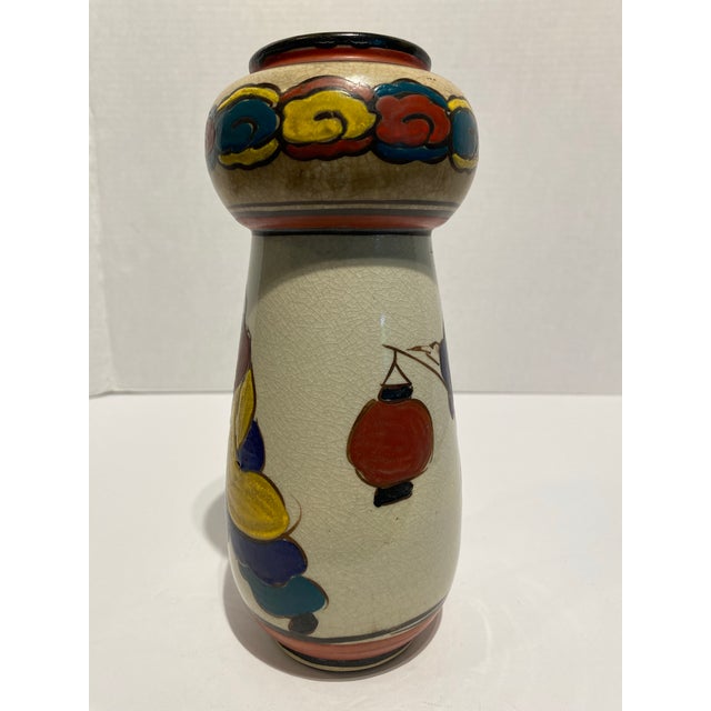I love the unusual strong primary colors along with the informal design of this Japanese Vase. This style is a tribute to...