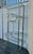 Vintage Mid Century Modern Hollywood Regency Brass Etagere in the Milo Baughman Manner by Design Institute America. Circa...