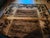 This curated assembly features an authentic, highly collectible pair of sand-cast brass dolphin andirons made by the...