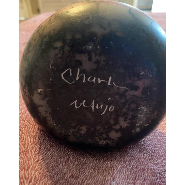 No imperfections. Had to pick a choice to continue. Beautiful Navajo Horsehair Pottery. 5 inches. Feathers all around. No...