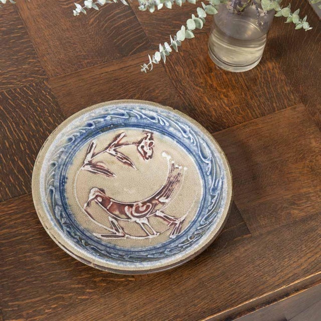 Stunning Mashiko pottery plate from Japan, 1950s. Cream crackle glaze over iron-rich clay ceramic plate with bird and...