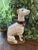 This porcelain Hollywood Regency greyhound or whippet stands 14” high and is such a graceful addition to styling your...