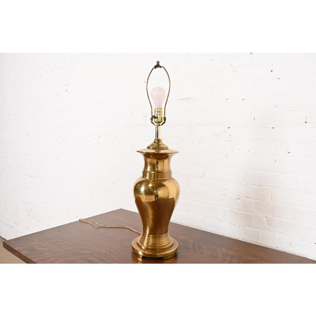 An exceptional Mid-Century Modern Hollywood Regency large brass table lamp In the manner of Tiffany & Co. USA, Circa...