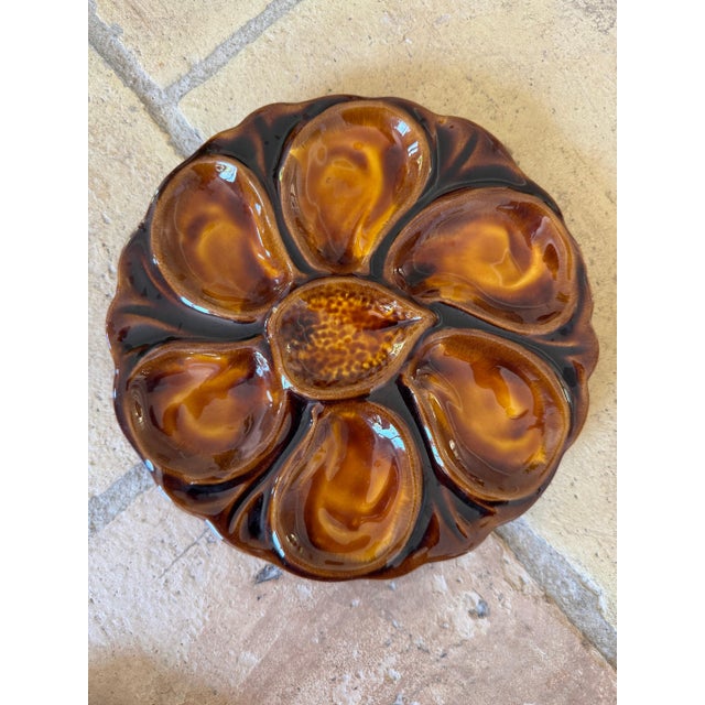 Set of six French brown and gold oyster plates. Mid 20th c. No makers mark 9”dia 49-087