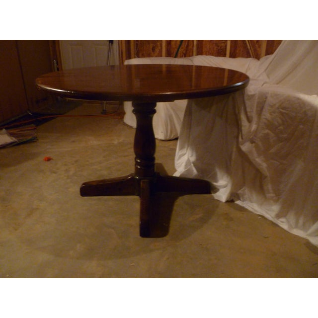 This Ethan Allen solid wood table is rich in multi color tones from brown to gold. Original and well taken care of in one...