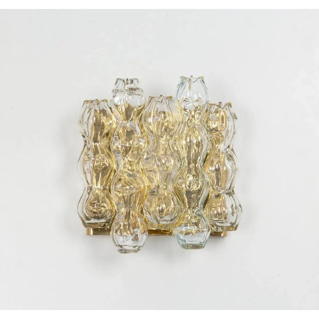 Wonderful pair of midcentury wall sconces with murano glass tubes, made by doria leuchten, germany, manufactured, circa...