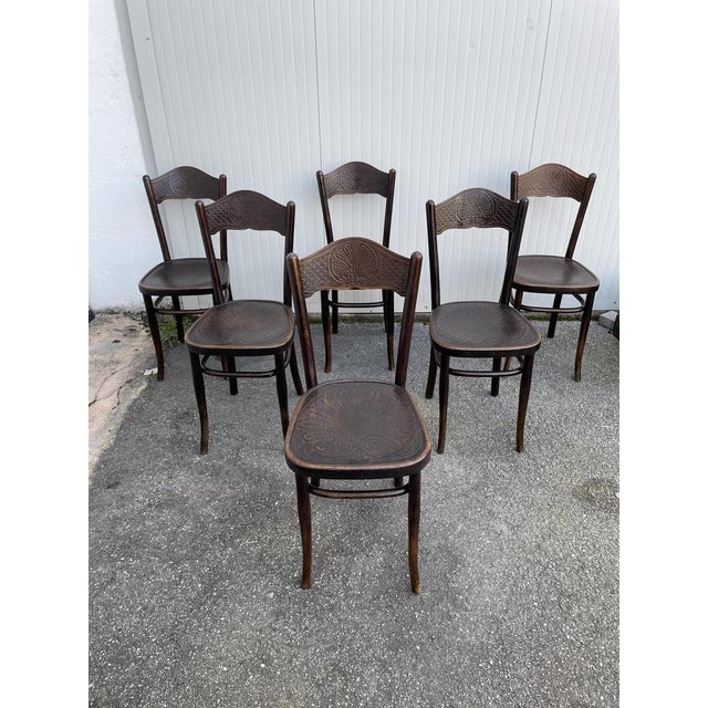 Group of 6 bistro/dining chairs in beech wood, Jacob & Josef Kohn, late 19th, early 20th century. Seats and backrests with...