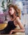 This oil on panel artwork captures a moment of introspection as a woman lounges in a sunlit room, her relaxed posture...