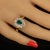 This is part of Chairish’s Fine Jewelry assortment. Exquisite Brazilian Emerald & White Sapphire Ring in Gold Rhodium Over...