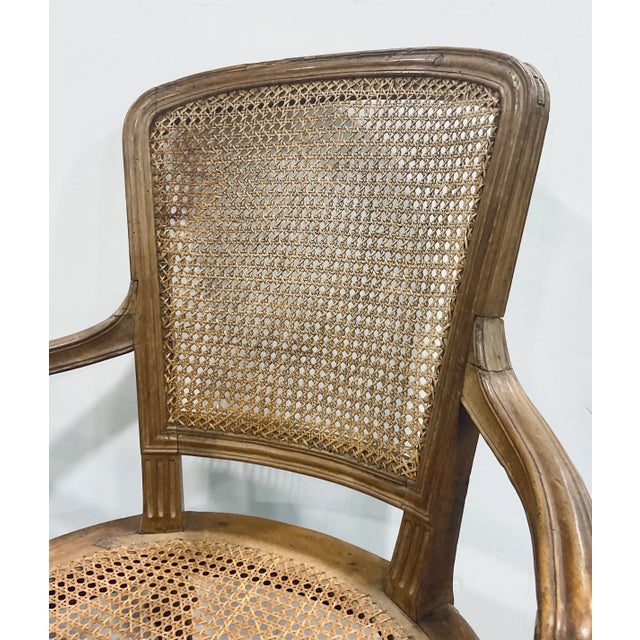 Elegant and classical Antique Late 19th Century French Caned Arm Chairs Pair, warm oak