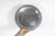 11” antique round silver quadruple plated gallery tray with a wide ribbed lip, and embossed detail on the base. In very...