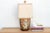 A vibrant narrative of Imperial history and polychrome ceramic mastery. This exceptional table lamp is crafted from a...