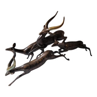 1980s Art Deco Leaping Impalas Bronze Statue by Loet Vanderveen For Sale