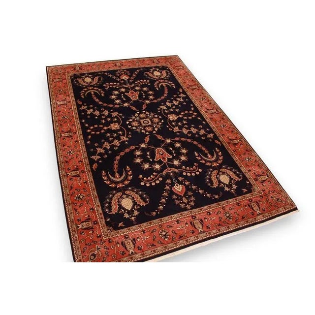 Traditional Middle Eastern Sarouk rug | Knot density: 300.000 knots/m² | Pattern: Colorful leaf and floral motifs | Size:...
