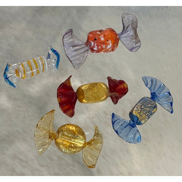 A beautiful set of 5 Italian Murano candy sculptures, in blue, gold, red, purple, yellow and orange. MAKER'S MARK: None...